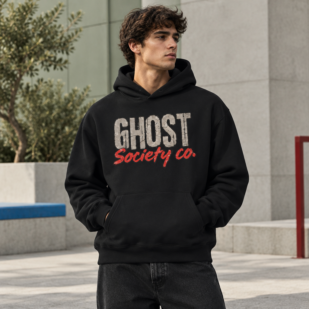 Model wearing GHOST SOCIETY CO. heavyweight pullover hoodie in a modern urban setting